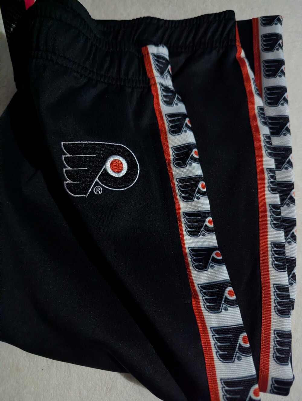 NHL Philadelphia Flyers Black Athletic Pants with White Logo Trim